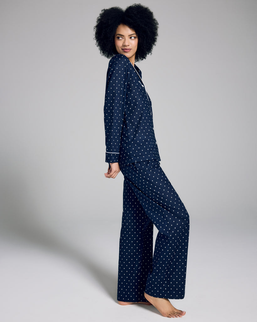 The Nelson cotton pajama from Derek Rose has a long-sleeved button down top and matching trouser with an elasticized drawstring waist