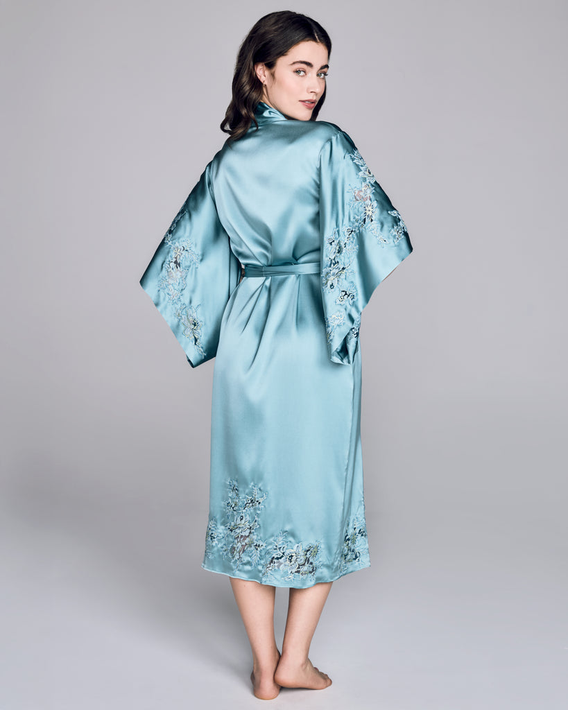 The Astri robe from Emma Harris has 3/4 kimono sleeves, belt closure, hits at the calf.  