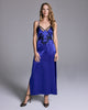 Glamorous Fallon silk gown from Emma Harris is crafted from a vibrant potion blue-purple silk with sheer black tulle and shimmering black lace appliqué
