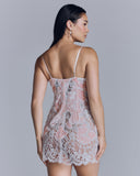 The Lily pink velvet chemise from Emma Harris has silk lined triangle cups, adjustable silk spaghetti straps, and a hidden back zip for fit