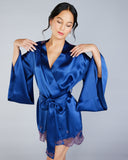 The Veronique robe from Emma Harris has traditional vented 3/4 kimono sleeves are crafted from double-layered silk for a luxurious weight