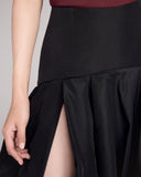The high side slit on the Sussy skirt from FrancesKa is playful and functional, offering ease of movement