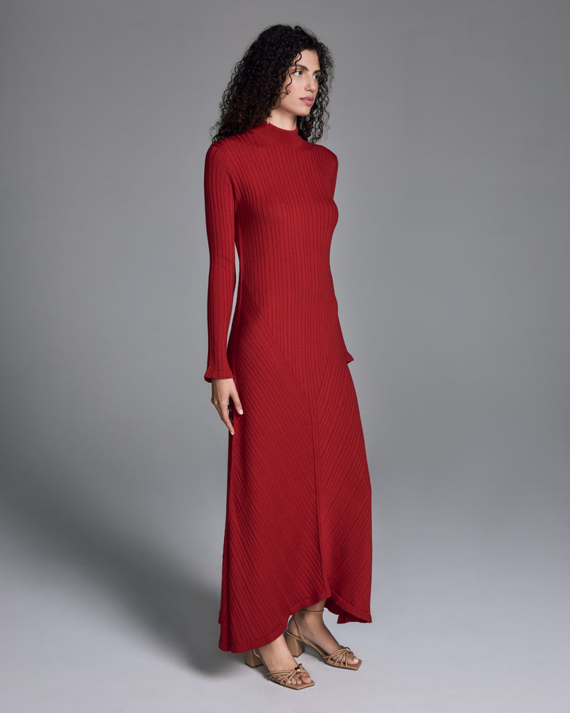 Maxi length Eilean sweater dress from John Smedley is crafted from a temperature regulating bright ruby red extra-fine ribbed merino wool