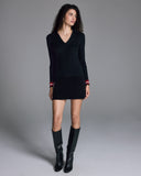 Classic fine ribbed black Ellair sweater from John Smedley is crafted from temperature regulating extra fine Merino wool with unique red and white intarsia stripes at the ends of the sleeves