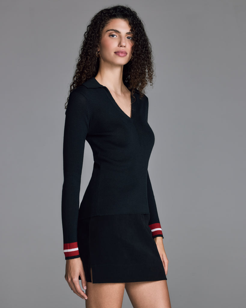 John Smedley's Ellair sweater is a long sleeved design with a fashioned collar, v neckline, and shaped rib detailing