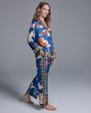 The classic button-down top on the Isa Tori Blue Silk Pajama has a generous fit with a notched collar, white piping, and contrast print at the collar, cuffs and hem