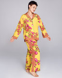 Karma's Isa Yuri Yellow classic button-down pajama top has a generous fit with a notched collar, bright green piping, and contrast print at the collar, cuffs and hem
