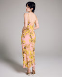 Karma's Edo Higa Slip Dress hits around the ankle on most, with a scoop neckline and a lower back