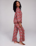 The Isa Kumo pant from Karma on the Rocks has a loose fit with a fully elasticized waist, pockets, and contrast print down the sides of the legs