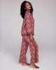 The Isa Kumo pant from Karma on the Rocks has a loose fit with a fully elasticized waist, pockets, and contrast print down the sides of the legs