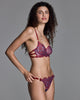 Eos Primaria Couture lingerie set is from Karolina Laskowska crafted from a unique blue and red lace paired with sapphire blue mesh and silk and hand-dyed red elastics