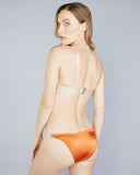 Tagetes low-rise bikini from Karolina Laskowska showcases beaded lace at the front with adjustable beige elastic sides and a sleek orange silk rear for wearability