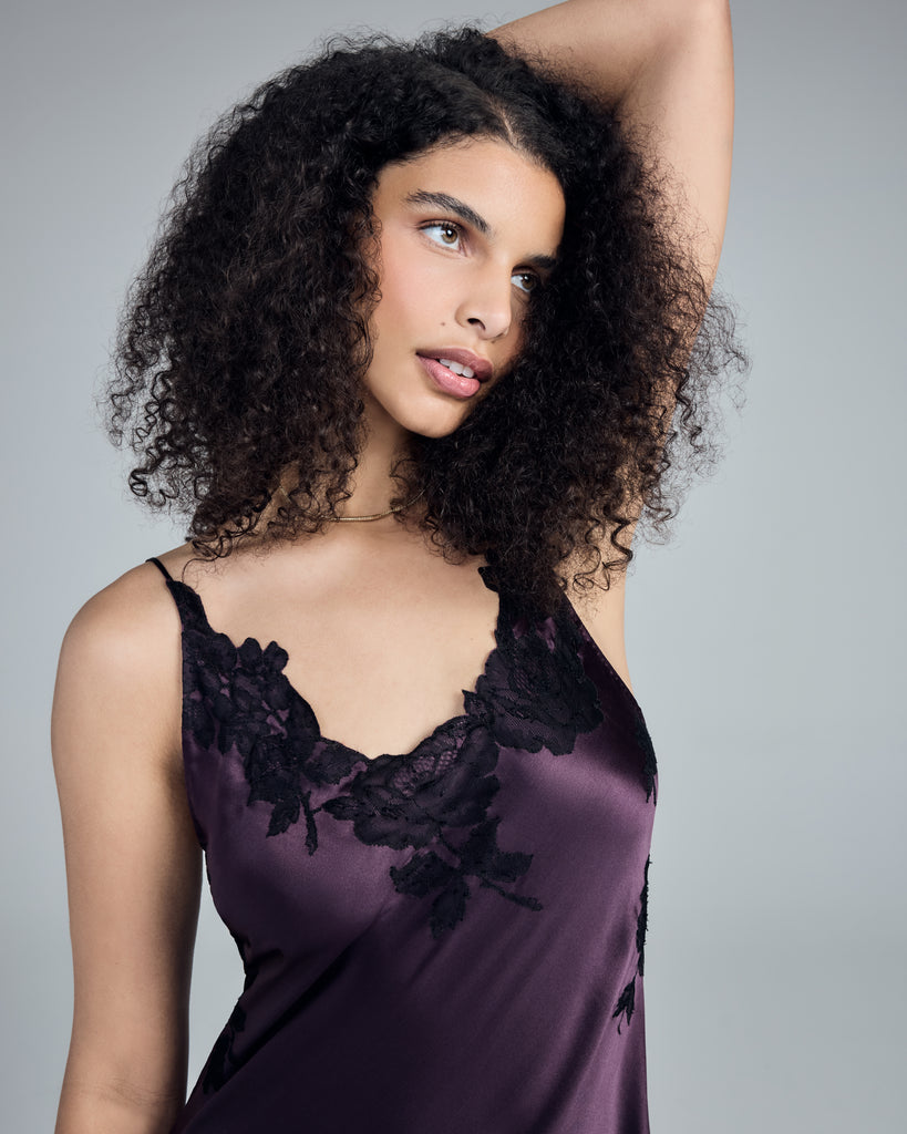 The Passion Violet chemise from Merle Noir has a v neckline with thin adjustable spaghetti straps