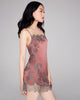 Silk chemise by Merle Noir is crafted from a dusky pink silk with intricate gray lace appliqué
