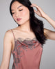 Sheer scalloped lace ornaments the straight neckline and hem on Merle Noir's Rustique Pink silk chemise