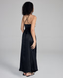 Designed to be wrappable with either side on top, this dress from Merle Noir has adjustable slim silk spaghetti straps that cross in the back, and slim silk ties wrap that around the waist