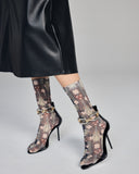 Shimmering lurex Mirea sock from Pierre Mantoux showcases a dramatic Art Nouveau-inspired Liberty print