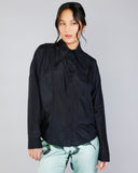 The Stelios Koudounaris Big Collar Shirt  boasts a bold oversized pointed collar, carefully crafted seaming, and fashion-forward wide dolman sleeves