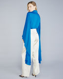 The Stelios Koudounaris Cobalt Bat Sleeves Blouse is crafted from a bright cobalt blue viscose/rayon blend