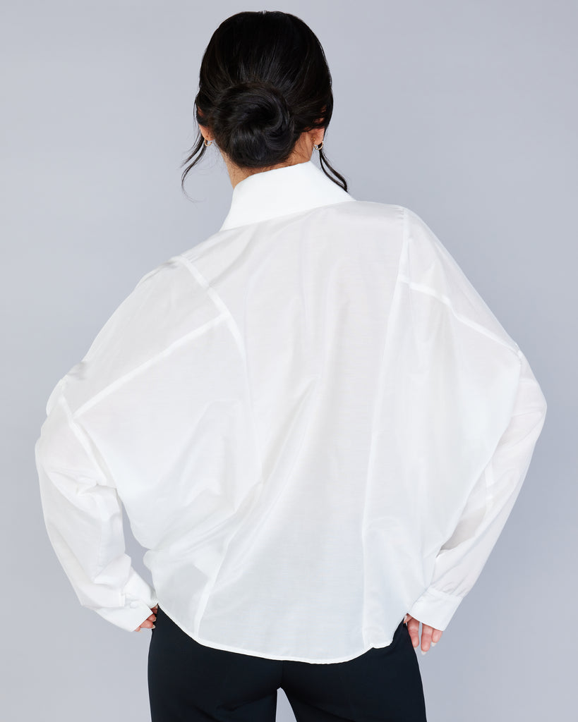 The Stelios Koudounaris Big Collar Shirt has princess seaming, wide dolman sleeves, and a subtly curved hemline