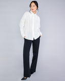 Whisper-weight blouse from Stelios Koudounaris is crafted from a gauzy white cotton/silk blend