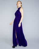 Floor length dress from Stelios Koudounaris is crafted from a vibrant purple velvet