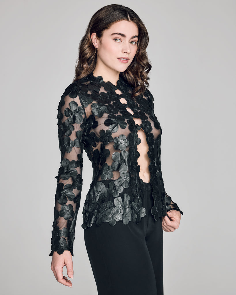 Zambak's daisy jacket is long sleeved with a slim fit and hidden hook and eye closures