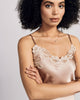 Sleek bias cut Clara camisole from Emma Harris features French seams throughout, with floral lace appliqué at the entire neckline and adjustable slim silk spaghetti straps