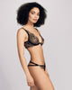 Underwired Tayla bra from Herve by Celine Marie has a deeply plunging neckline with lace appliqué at the sheer cups and on the band