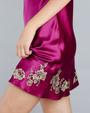 Celeste Raspberry slip from Emma Harris is crafted from fuchsia silk with shimmering gold floral lace appliqué 