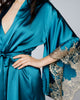 Teal silk Elsa robe from Emma Harris has a wide gold Leavers lace appliqué at the kimono-inspired vented 3/4 sleeves