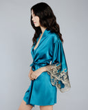 The Emma Harris Elsa robe has a wide silk collar, belt loops and a matching silk tie 