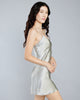 Figure-skimming Kitty slip from Gilda & Pearl is crafted from a pale silver silk 