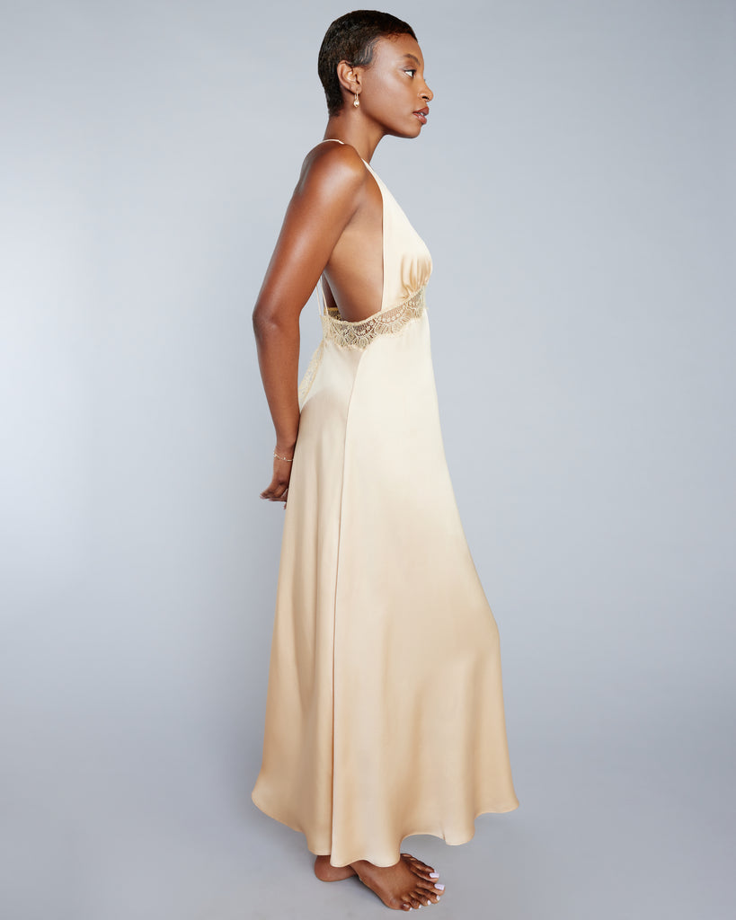 Glamorous silk Alexandria gown from Layalina is crafted from a pale gold silk with matching French lace