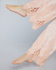 Layalina Nana pajama trouser has a fully elasticized waist with lace appliqué climbing up from the hem of the pants
