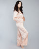 Decadent silk pajama from Layalina is crafted from a pale pink Italian silk with matching lace appliqué