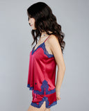 Stretch silk camisole set from Vannina Vesperini is crafted from a red stretch silk with navy blue lace accenting