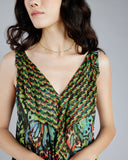 Permanent pleats and a draped high-low scarf hem add style to this endlessly comfortable blouse from Zoelle