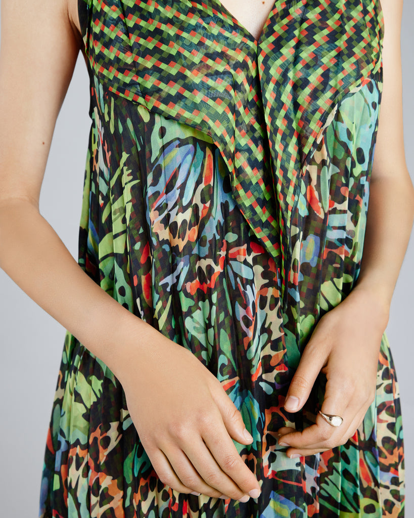 Permanent pleats and a draped high-low scarf hem add style to this endlessly comfortable piece from Zoelle