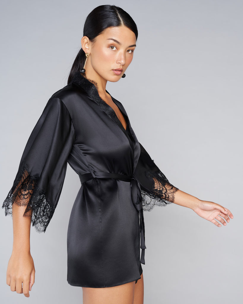 Black silk robe from Emma Harris is accented with shimmering scalloped transparent French eyelash lace