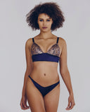 Navy silk bralette set from Cadolle has metallic bronze leafing at the cups in an abstract crinkle pattern