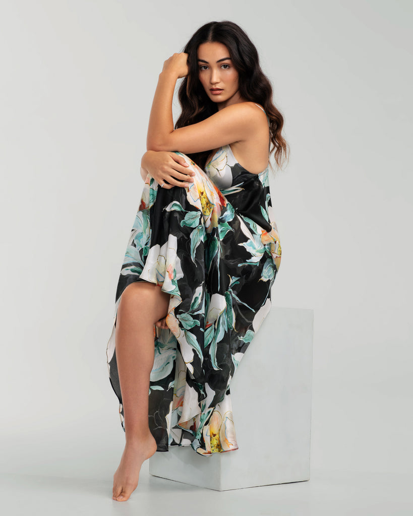 Christine Vancouver Ophelia silk gown is constructed of ultra lightweight black silk charmeuse with an oversized floral print in shades of white, yellow, orange, red and teal