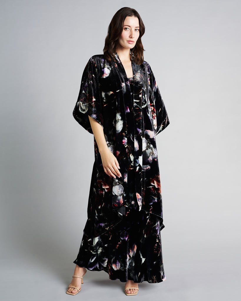 Christine Vancouver Moonlight silk velvet robe has a floral pattern in shades of white, pink, purple and red against a black background