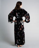 Floor length Moonlight silk velvet robe from Christine Vancouver has a floral pattern in shades of white, pink, purple and red against a black background