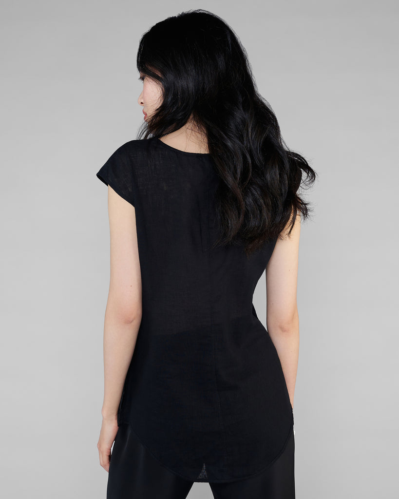 Black linen Dana Pisarra top has wide, bra-friendly straps, a v-neck, and a slightly longer rear