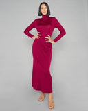 Long sleeved turtleneck dress from Dana Pisarra is crafted from an amarena red 70% wool 30% silk knit