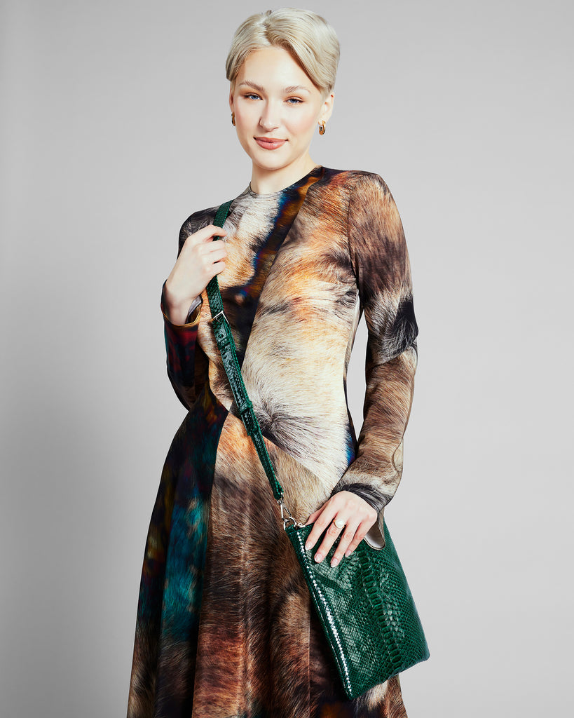 Cross-body purse from Elisabeth Weinstock is crafted from emerald green glazed snakeskin 