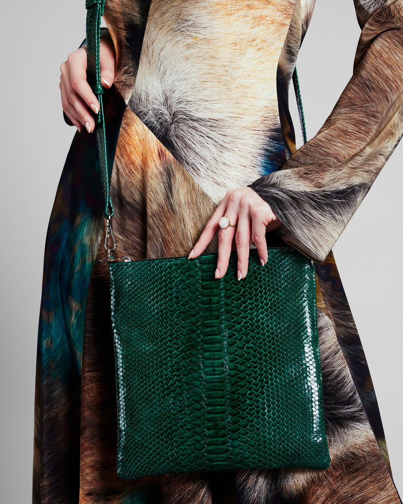 Elisabeth Weinstock Tokyo Purse measures approximately 10” x 11” x 1” with a removable strap that’s adjustable between 22-28”