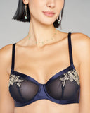 Underwired Elsa bra from Emma Harris has sheer double-layered navy tulle cups with a center seam for fit, with gold lace applique and navy silk banding at the upper cups