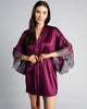 Emma Harris Rochelle robe is crafted from a berry purple stretch silk with shimmering purple lace at the sleeves